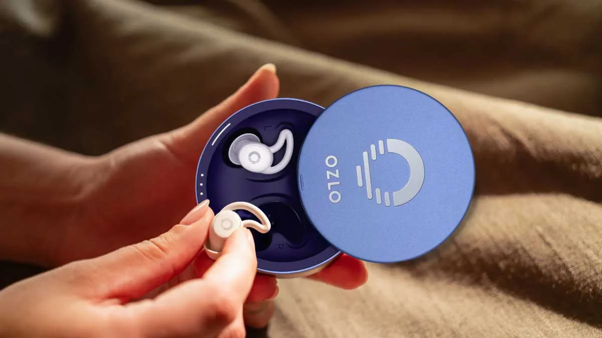 Wireless earbuds in blue case with Ozlo logo for international use.